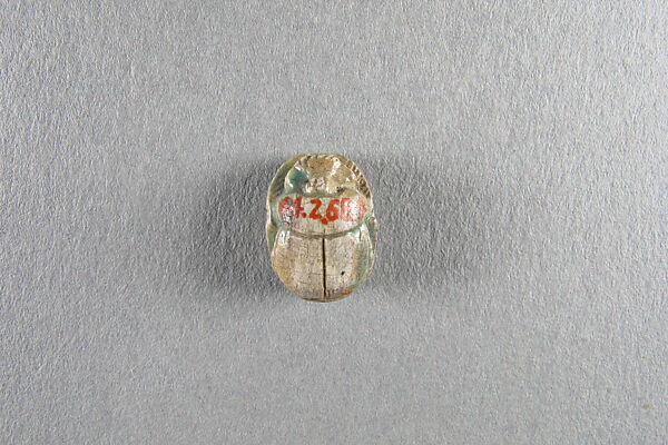 Scarab, disk, Steatite, traces of green glaze