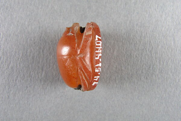 Scarab Inscribed with Horus Supporting the Sun Disk, Carnelian, copper