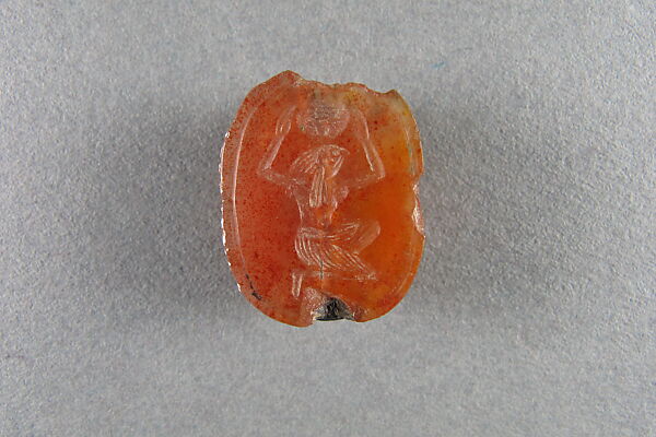 Scarab Inscribed with Horus Supporting the Sun Disk, Carnelian, copper 