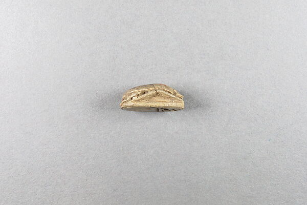 Scarab inscribed with the name of Unis, Steatite, traces of glaze