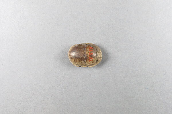 Scarab inscribed with the name of Unis, Steatite, traces of glaze