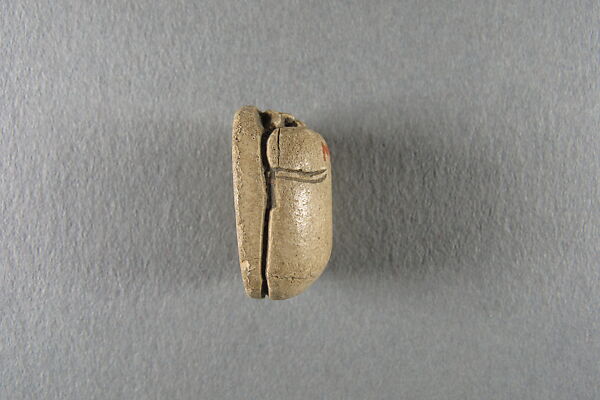 Scarab, Faience, traces of green glaze