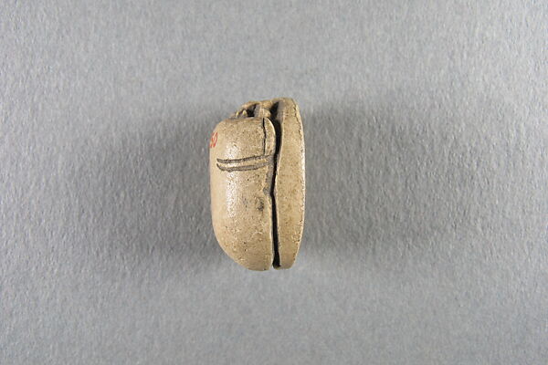 Scarab, Faience, traces of green glaze