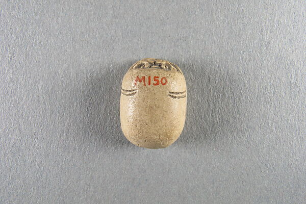 Scarab, Faience, traces of green glaze