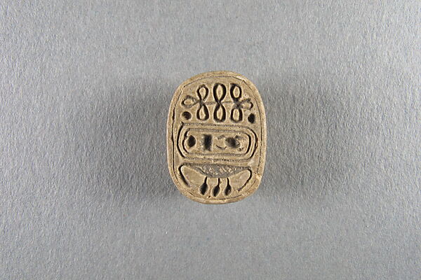 Scarab, Faience, traces of green glaze