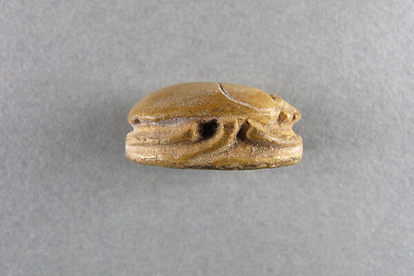 Scaraboid plaque, Yellow faience