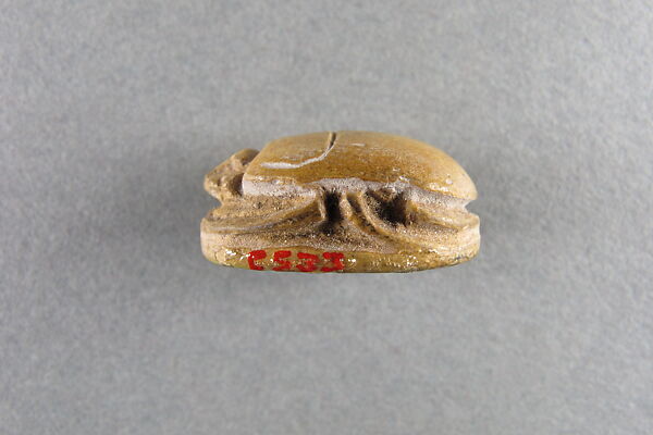 Scaraboid plaque, Yellow faience