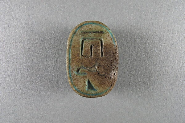 Scarab inscribed with the name Taharqo, Faience 