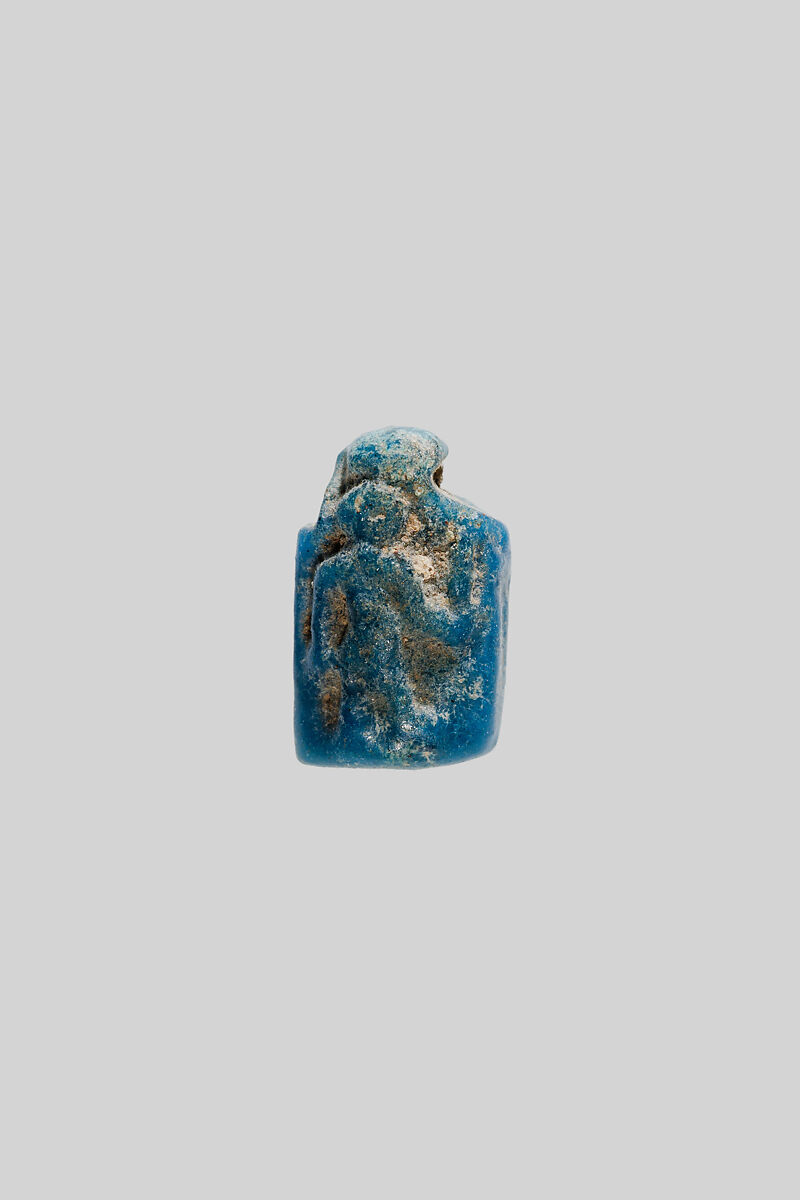Amulet of a standing deity, Faience 