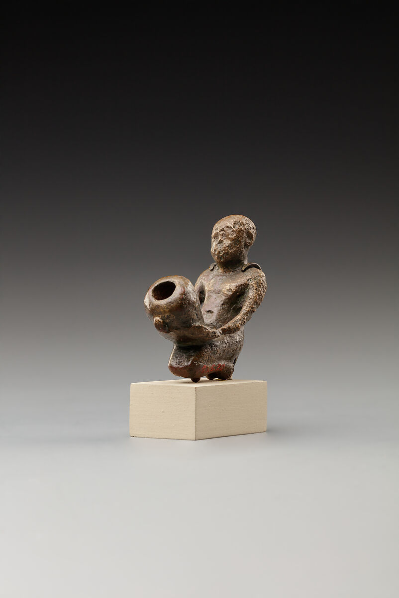 Statuette of a cult attendant with a jar, Bronze or cupreous alloy 