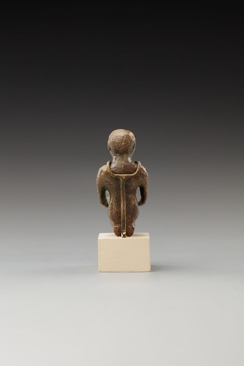 Statuette of a cult attendant with a jar, Bronze or cupreous alloy