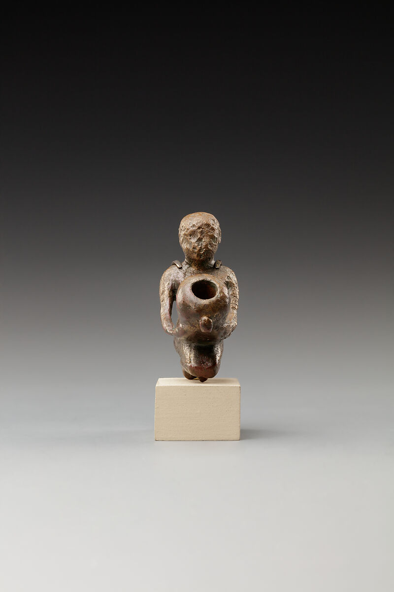 Statuette of a cult attendant with a jar, Bronze or cupreous alloy