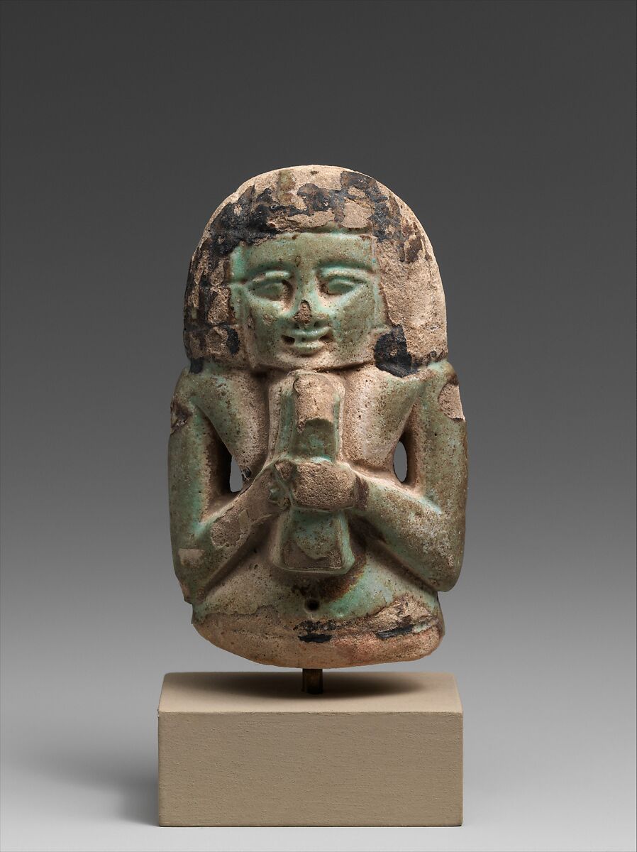Female figure playing a lyre, Faience 