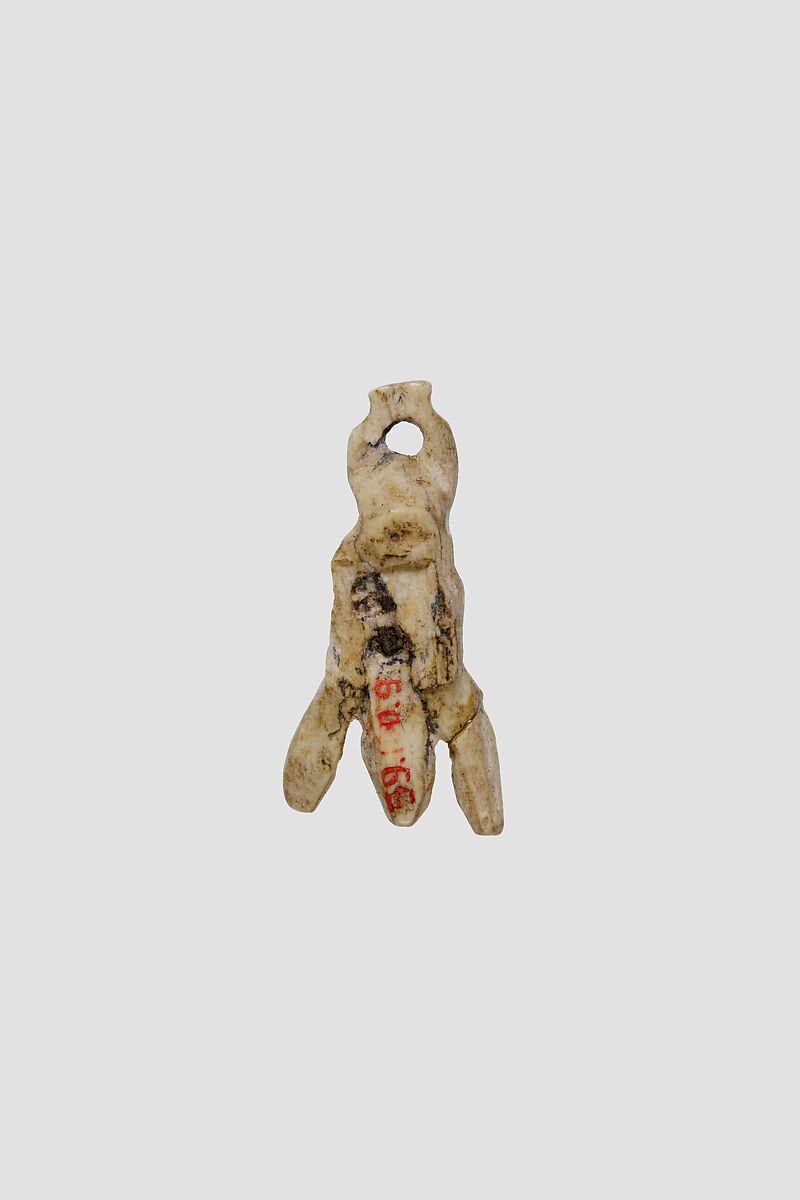 Fly amulet, Ivory or bone