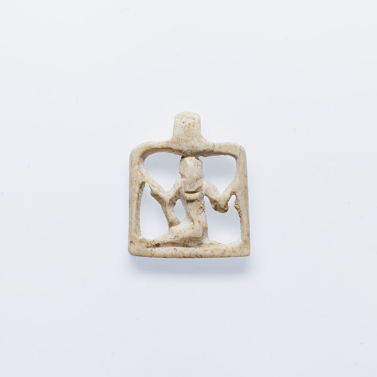 Heh sign amulet, Ivory or bone