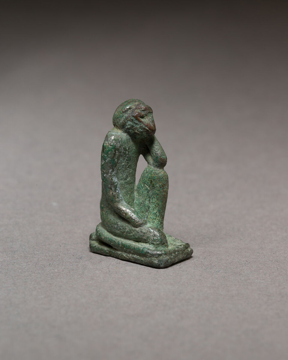 Monkey kneeling and resting its head in a hand, Bronze 