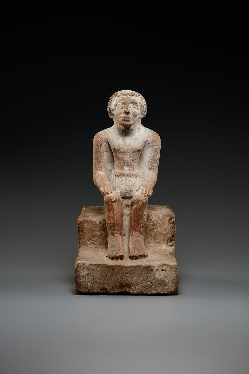 Seated man, Limestone 