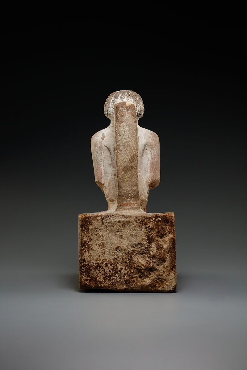 Seated man, Limestone