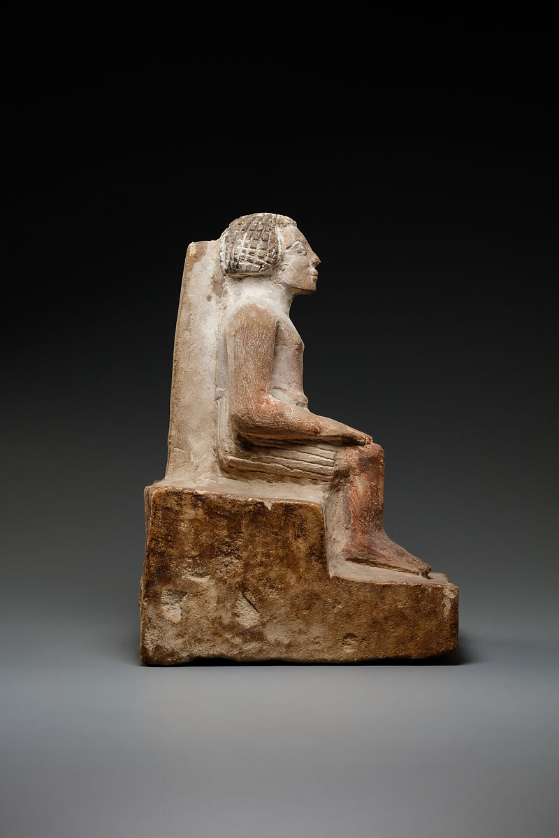 Seated man, Limestone