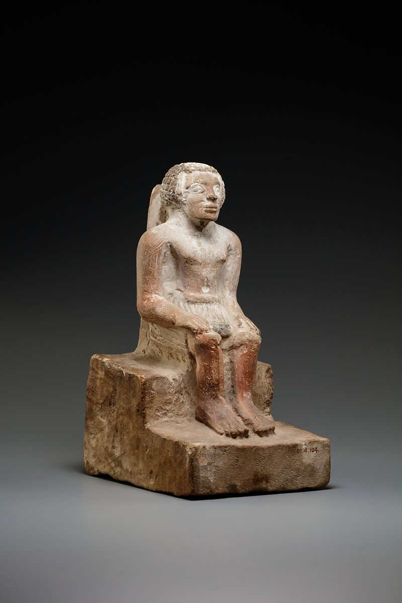 Seated man, Limestone
