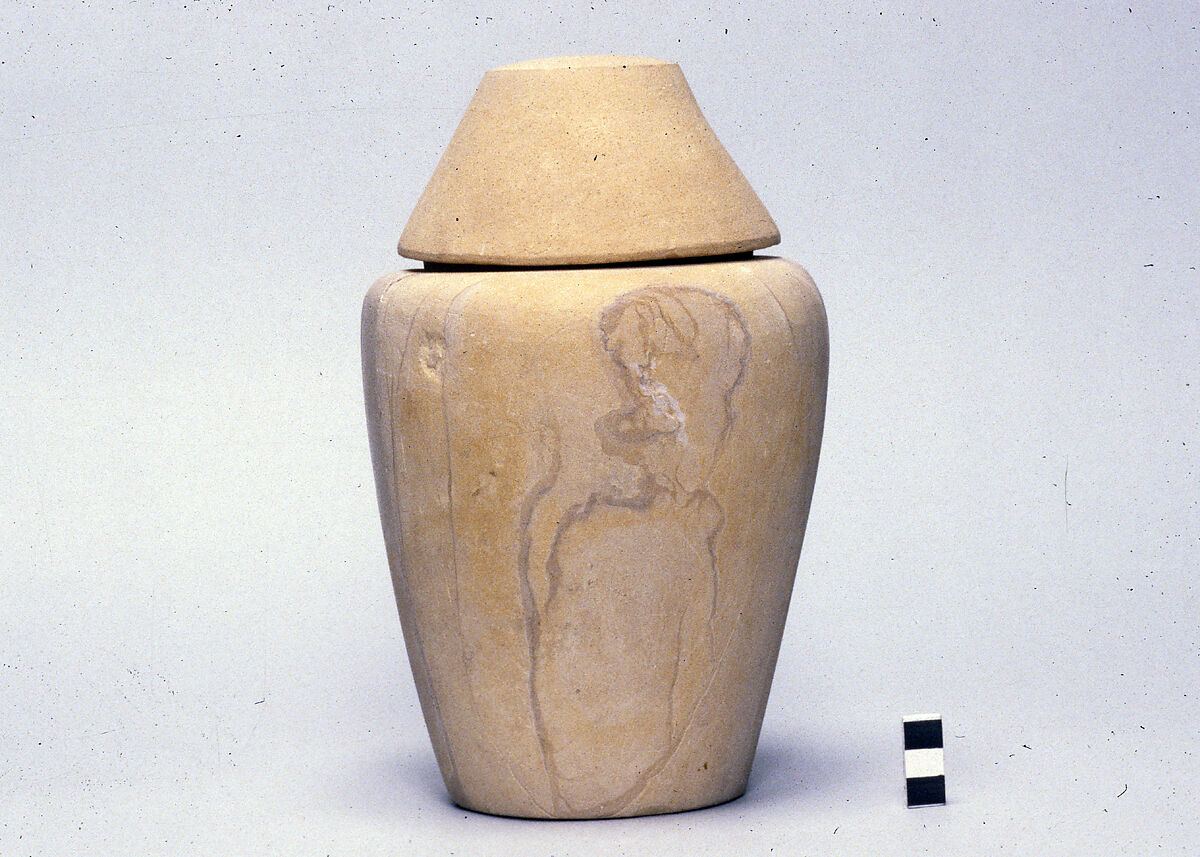 Canopic jar with conical lid, Yellow limestone 