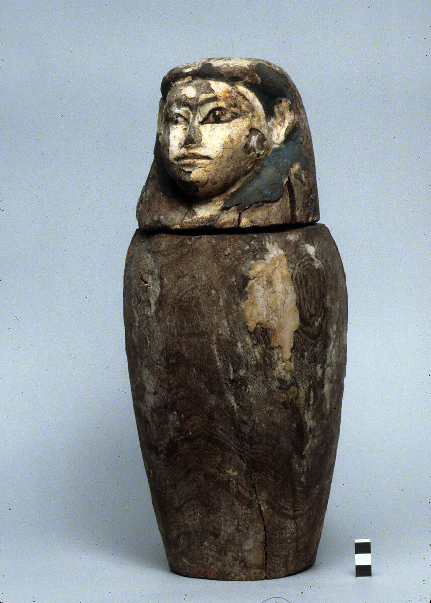 Canopic jar, Wood, gesso, paint, linen, possibly human remains 