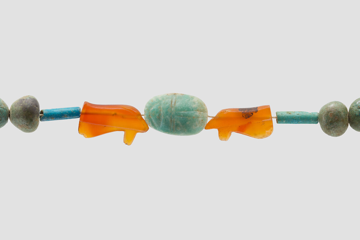 String of Beads and Amulets, Egyptian Blue, faience, carnelian, feldspar