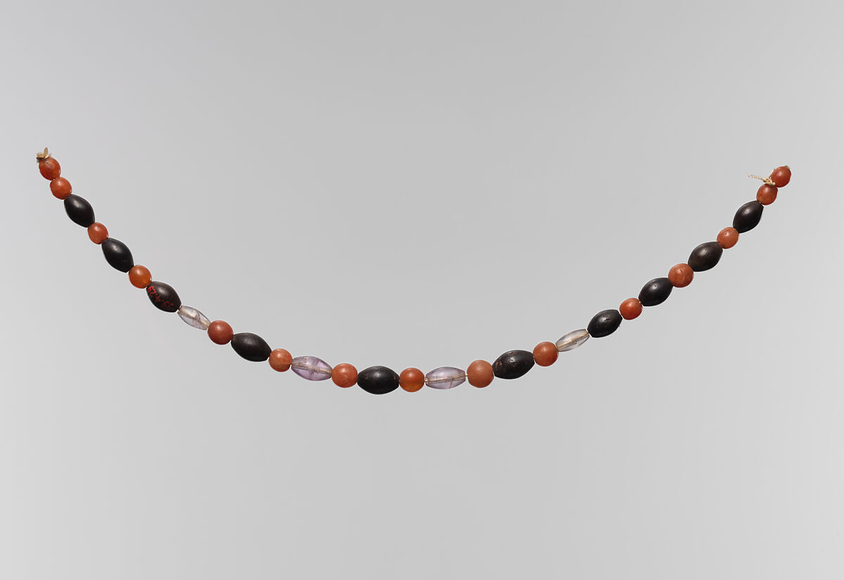 String of beads, Carnelian, amethyst, garnet, hematite; modern string 