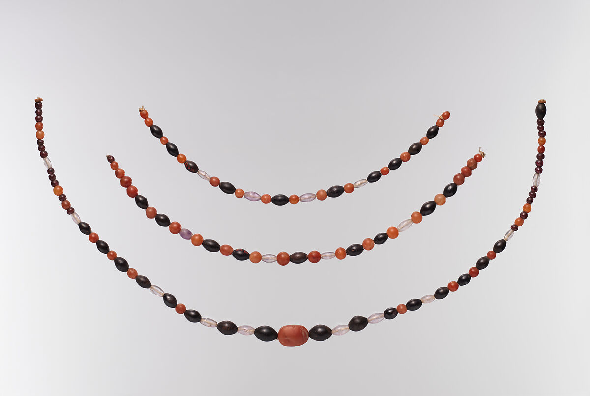 String of beads, Carnelian, amethyst, garnet, hematite; modern string