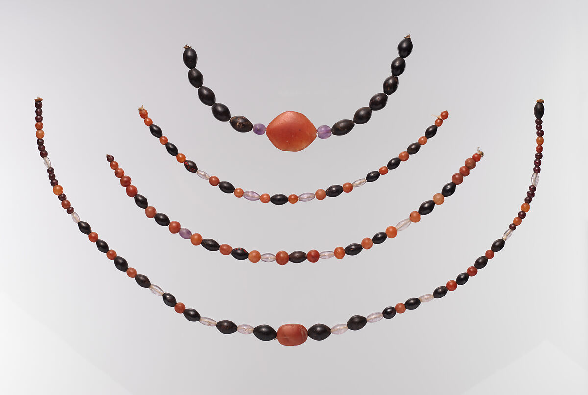 String of beads, Carnelian, amethyst, garnet, hematite; modern string