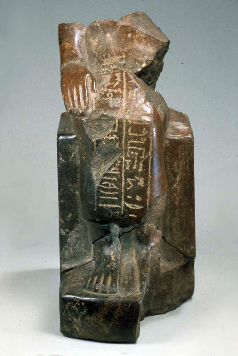 Lower half of the figure of the dignitary Anu, Stone