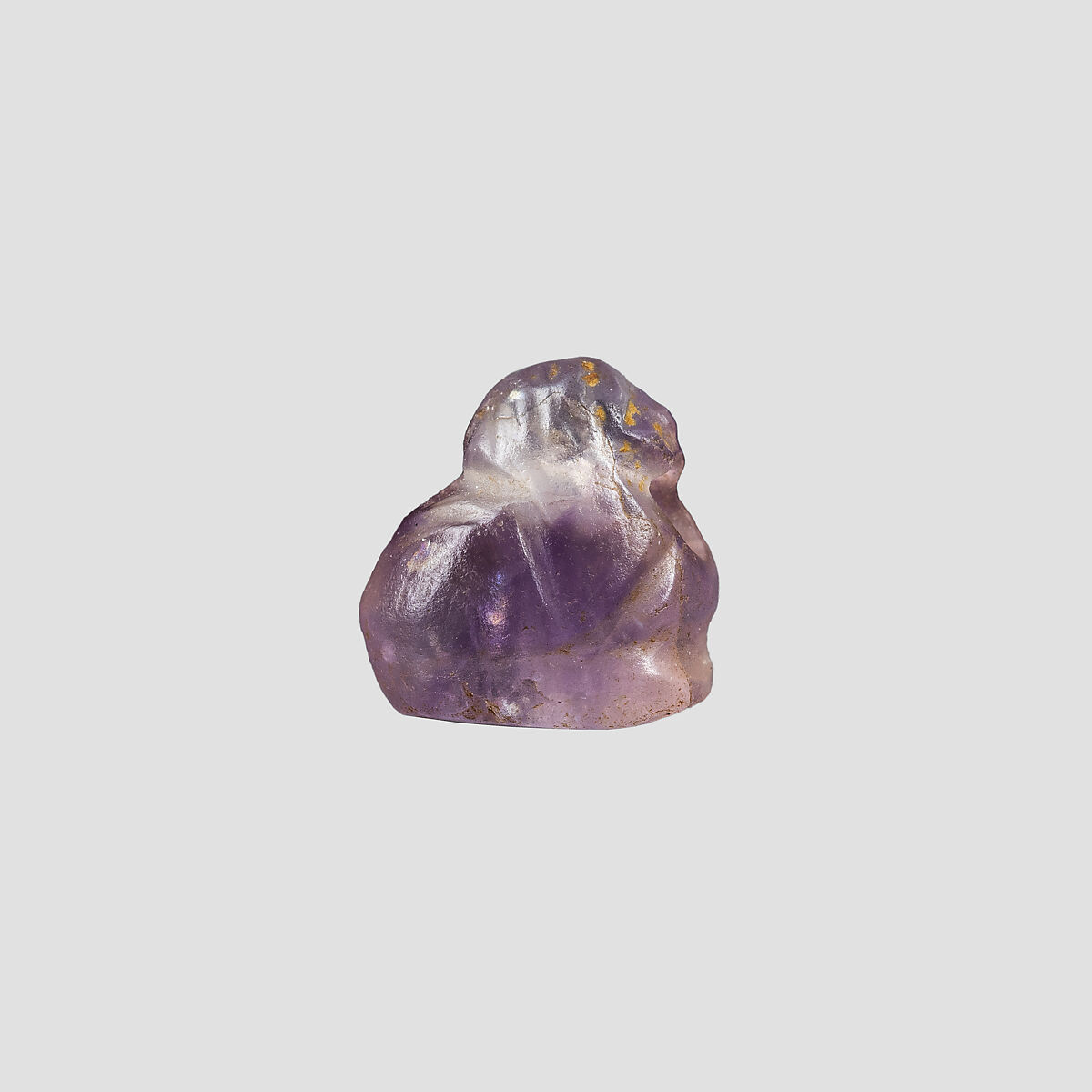 Human headed amulet (bird?), Amethyst 