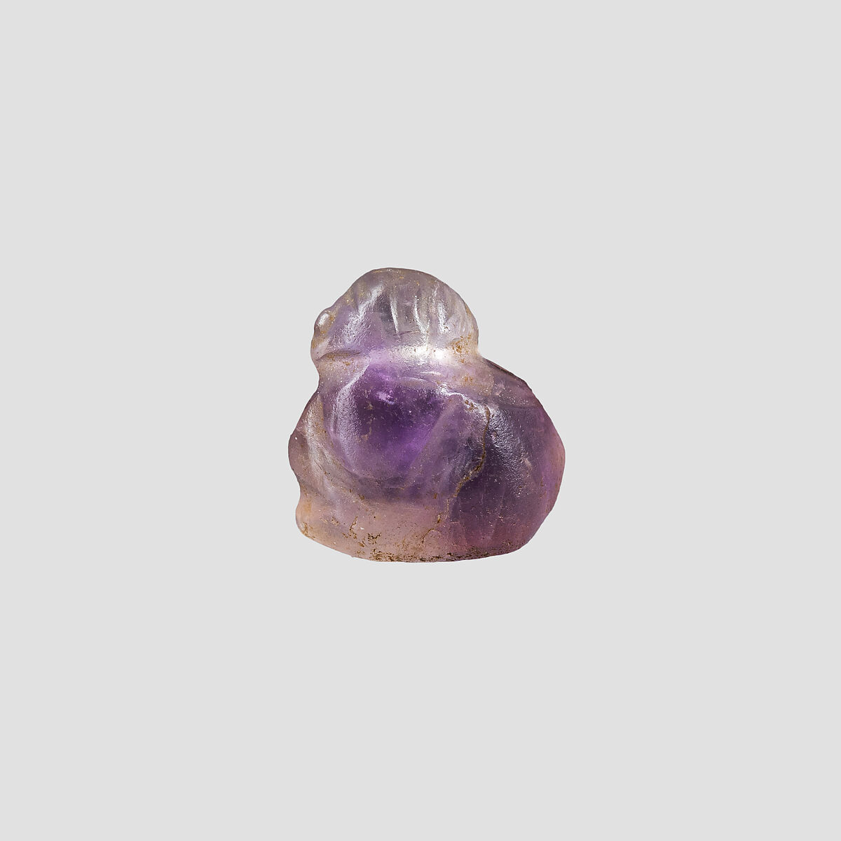 Human headed amulet (bird?), Amethyst