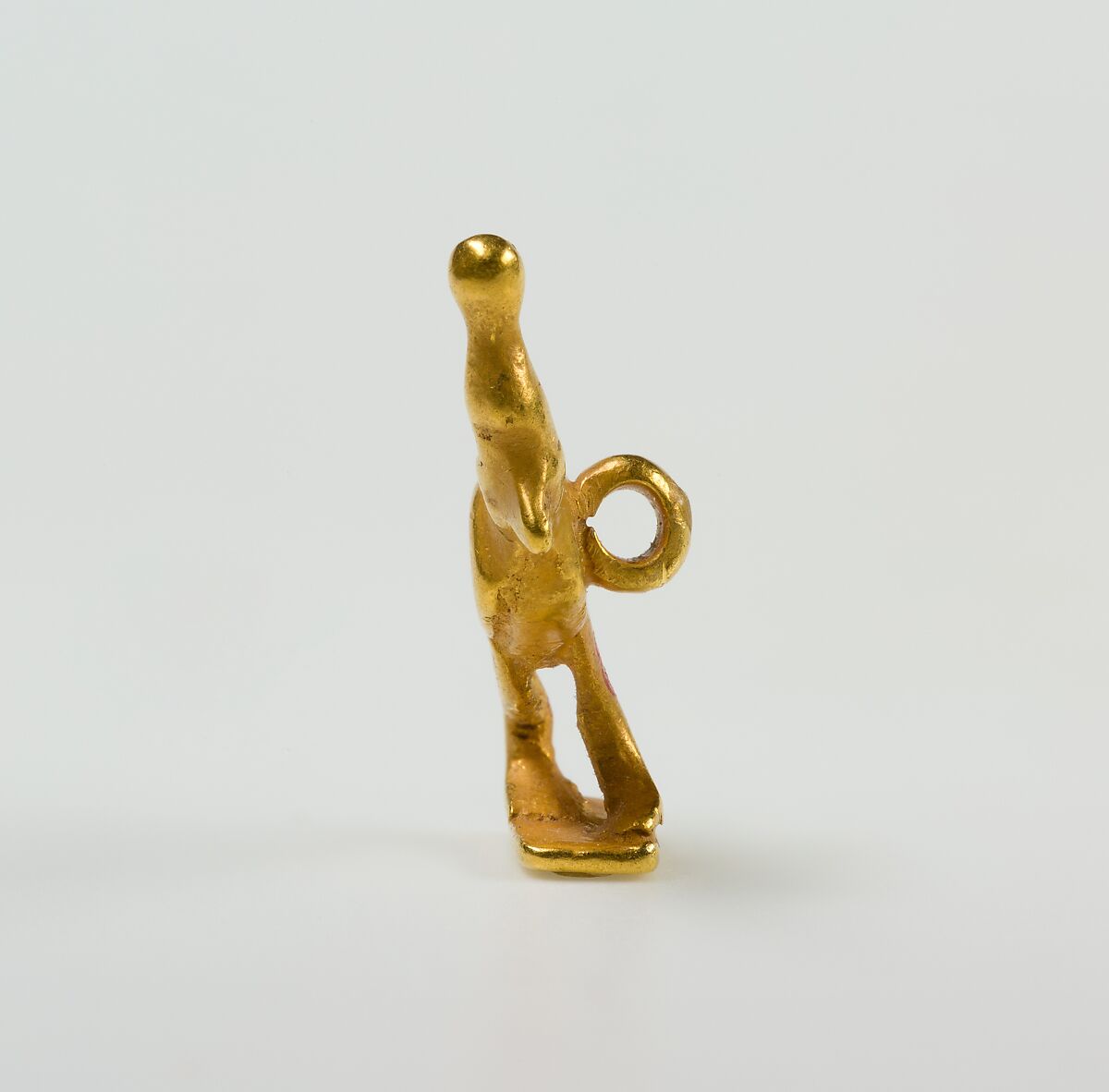 Quail chick amulet, Gold
