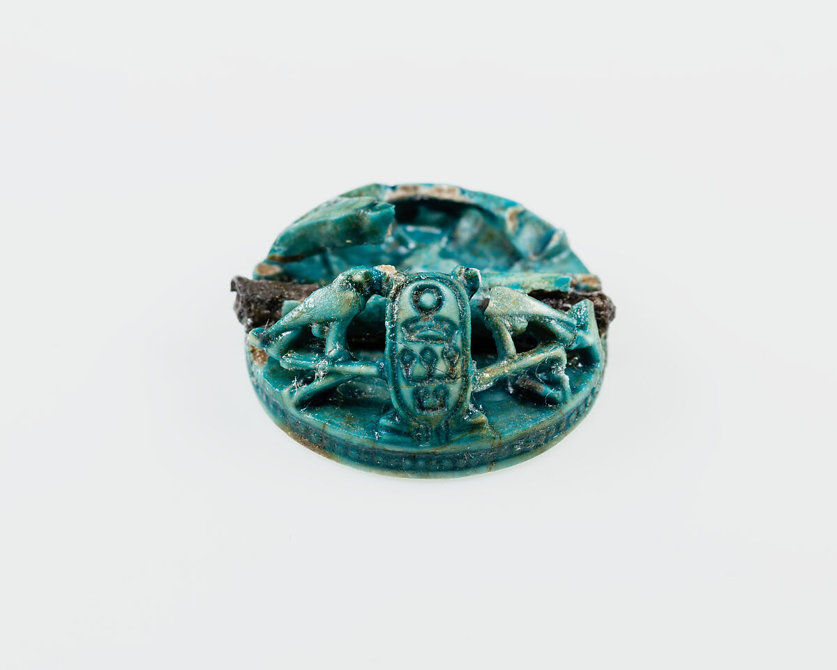 Button seal with the cartouches of Senwosret III, Green glazed steatite, metal pin in boring
