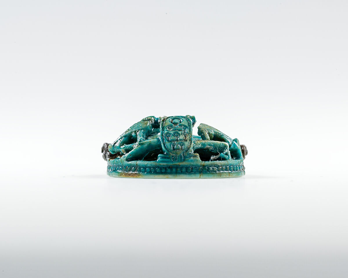 Button seal with the cartouches of Senwosret III, Green glazed steatite, metal pin in boring