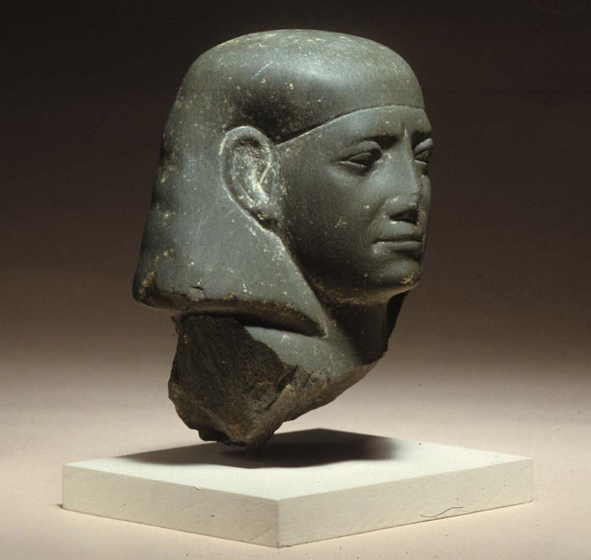 Head of a male statue, Greywacke