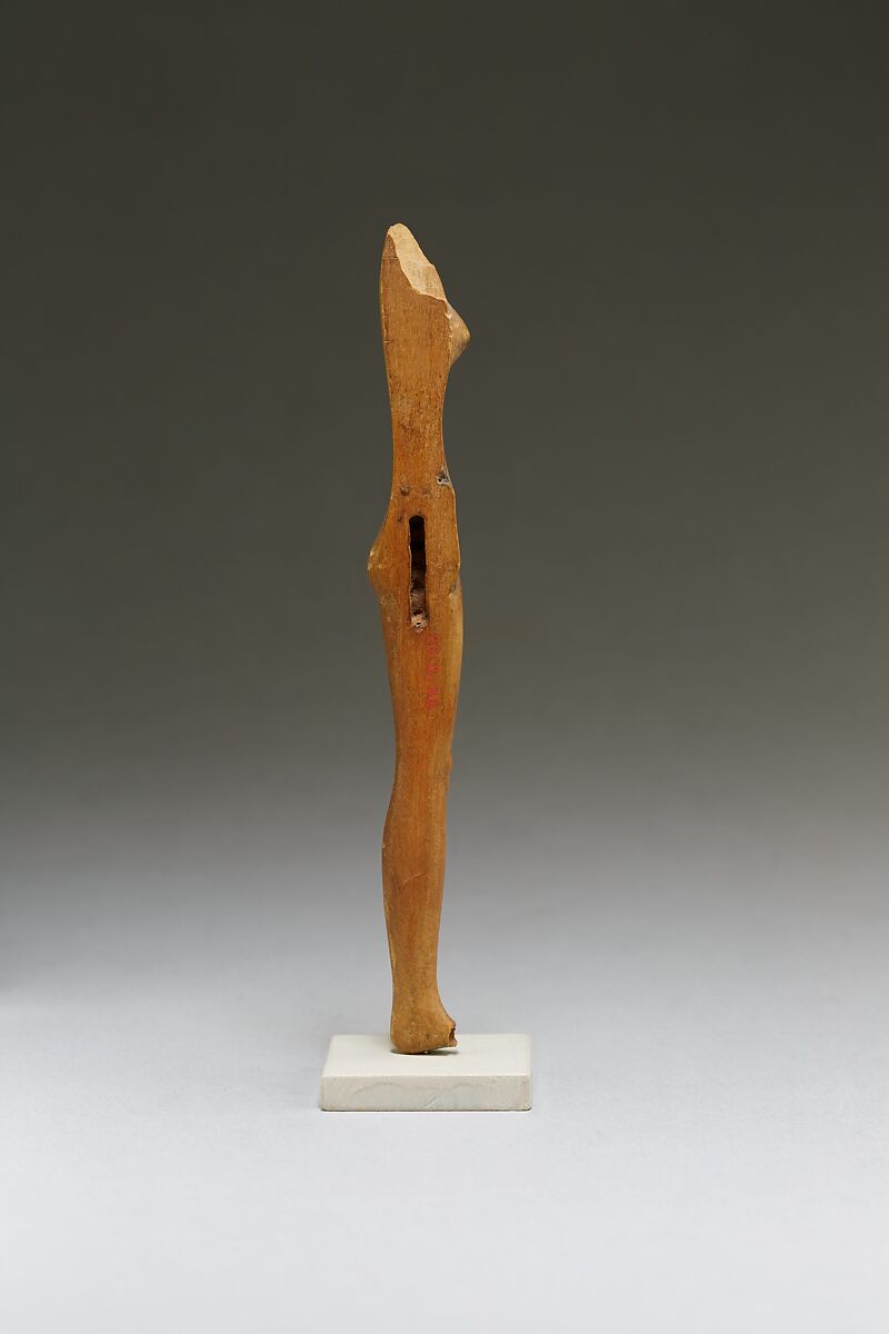 Fragment of female figure, Wood