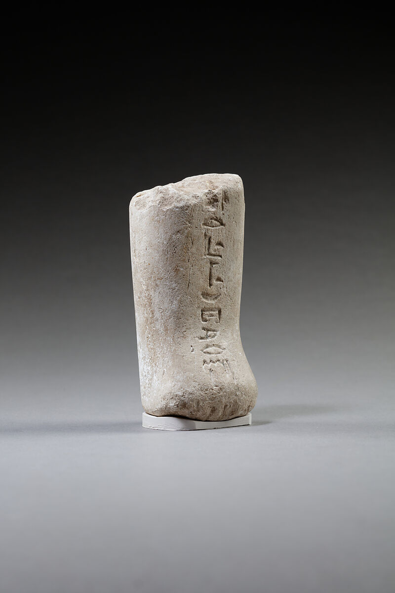 Lower part of a shabti, Limestone, paint