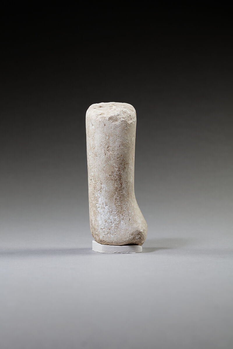 Lower part of a shabti, Limestone, paint