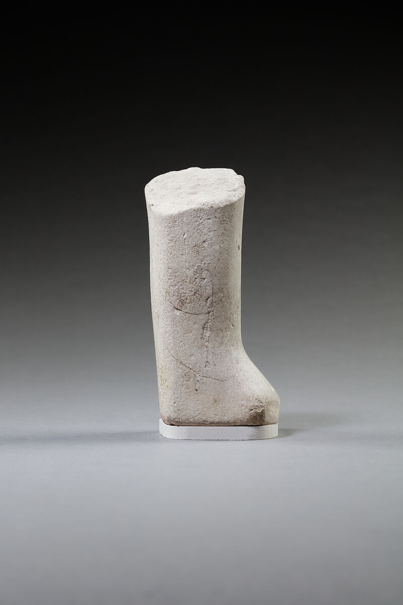 Lower body of a shabti of  a man called Apepi, Limestone