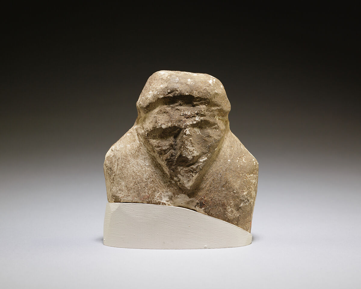 Magical figurine of foreigner, Limestone 