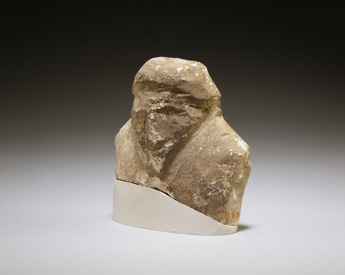 Magical figurine of foreigner, Limestone