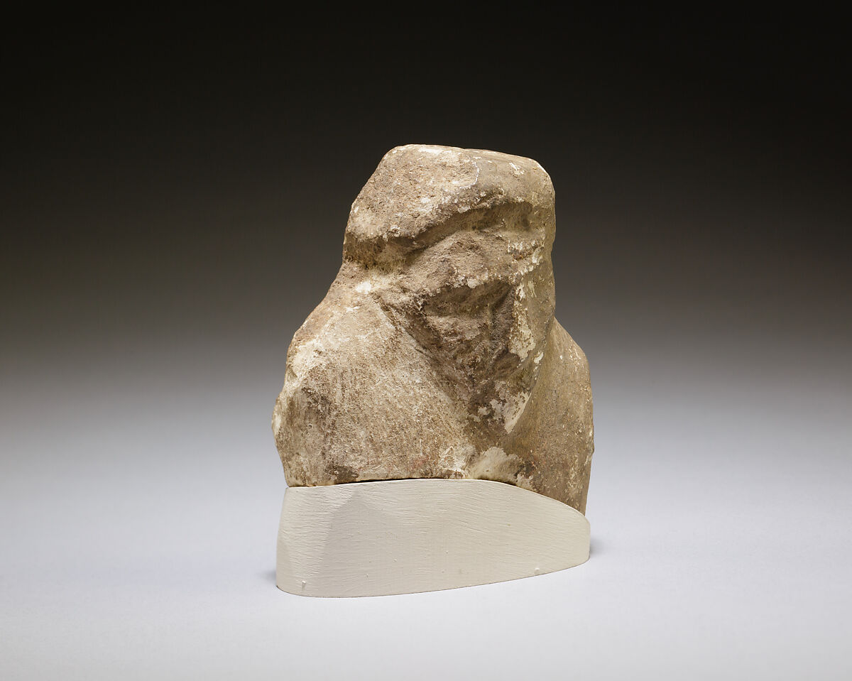 Magical figurine of foreigner, Limestone