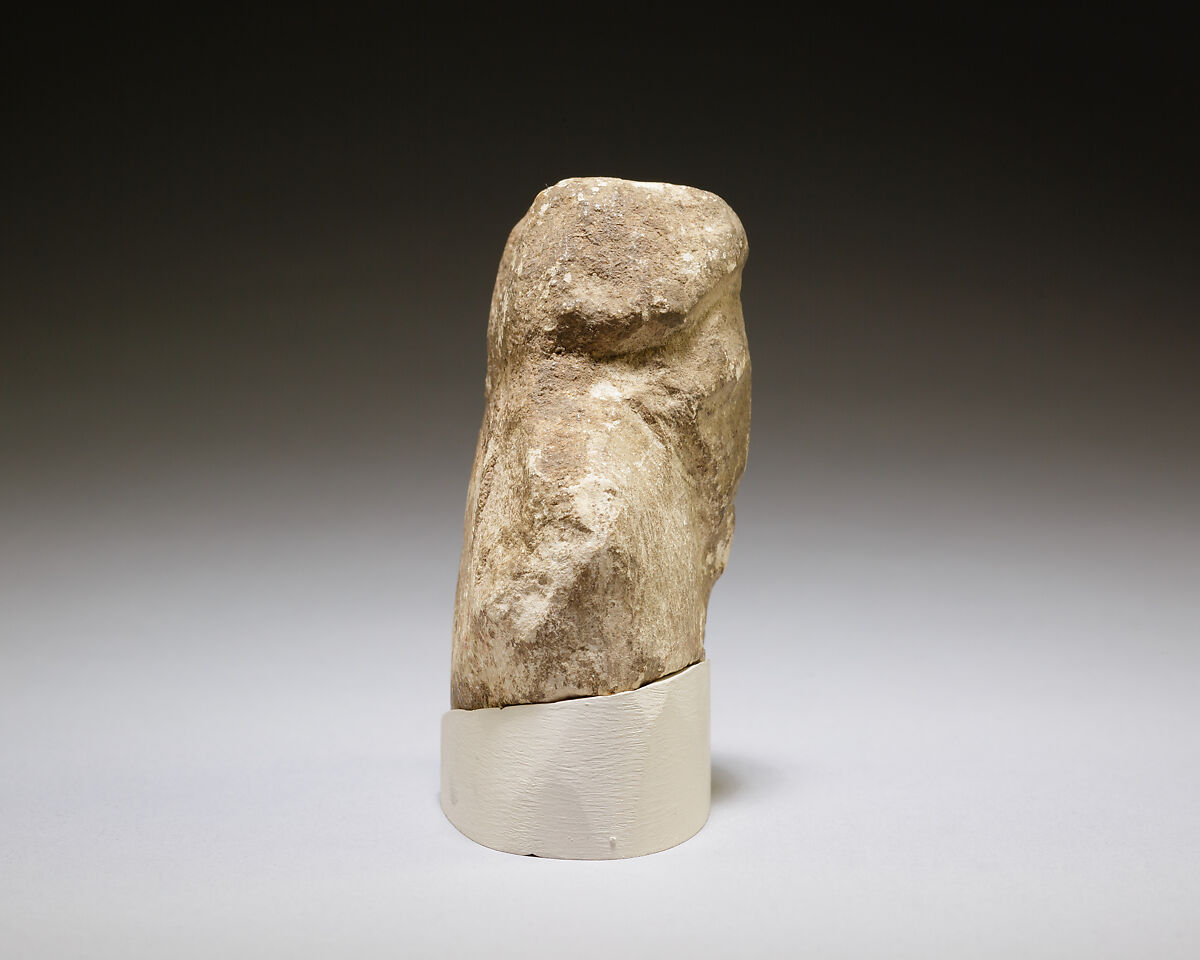 Magical figurine of foreigner, Limestone