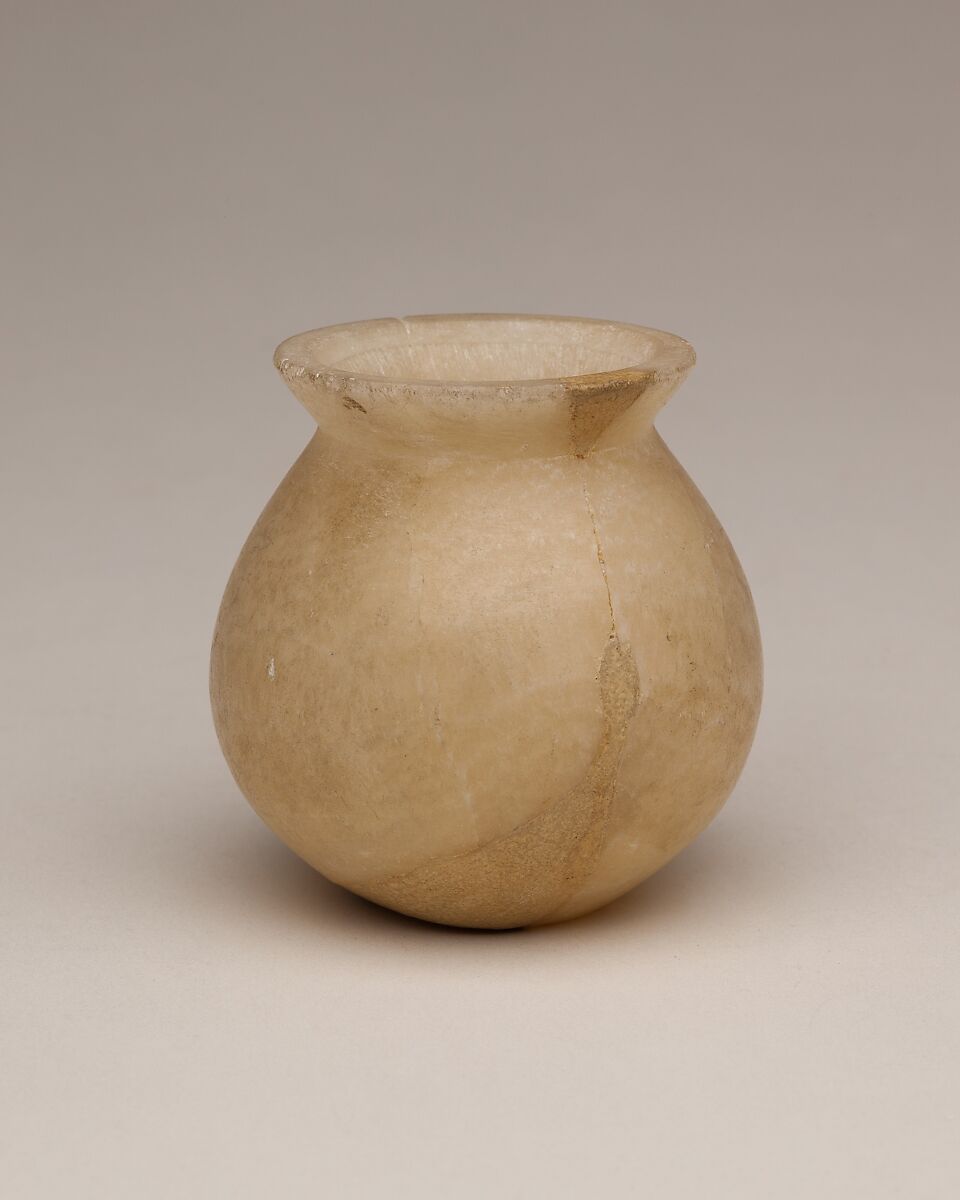 Kohl jar and lid, Travertine (Egyptian alabaster) 