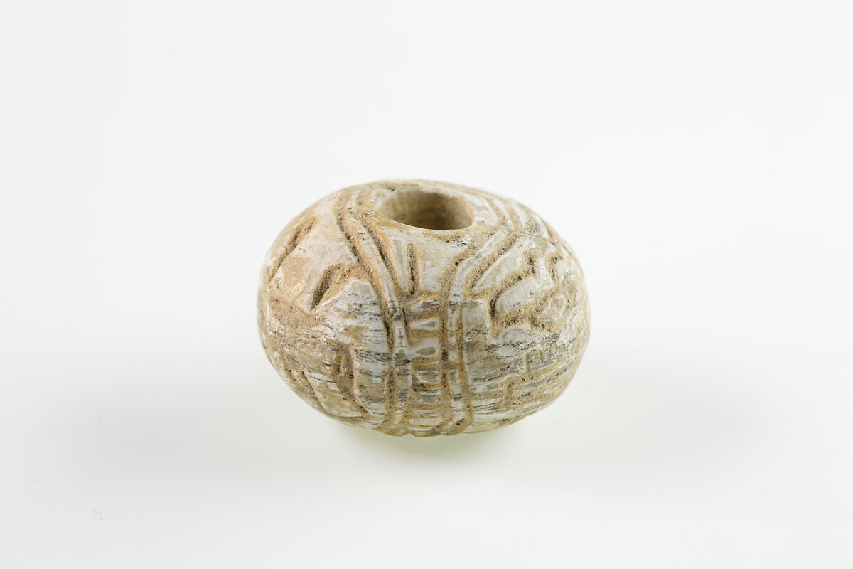 Bead with the name of Amenemhat II, Unglazed faience 