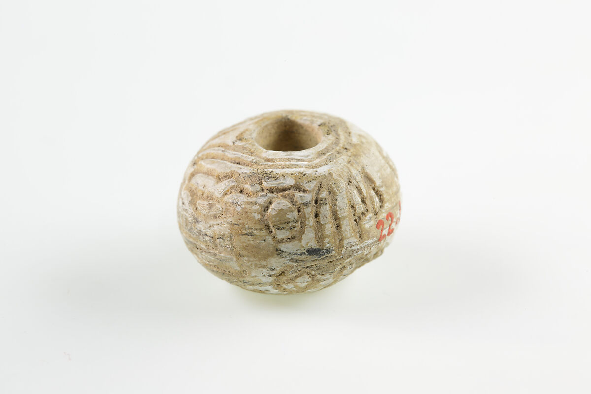 Bead with the name of Amenemhat II, Unglazed faience
