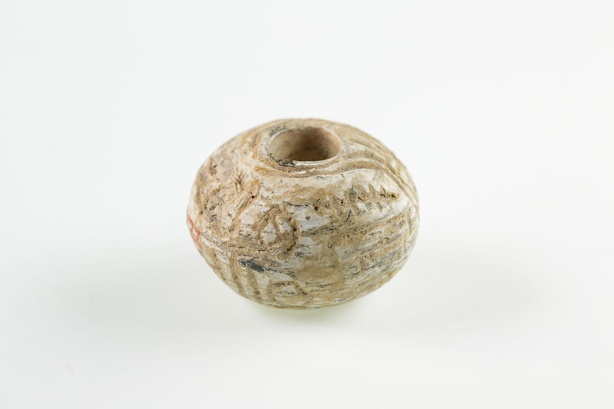 Bead with the name of Amenemhat II, Unglazed faience