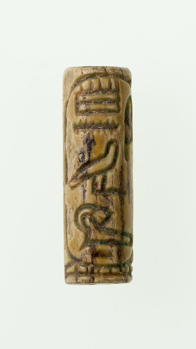 Cylinder seal of Amenemhat III, Steatite, traces of yellowish glaze 